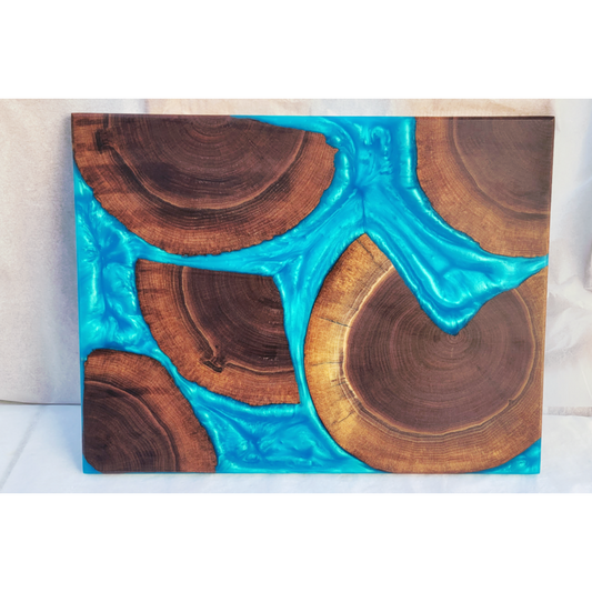 Live Edge Tree slices With Light Blue Epoxy