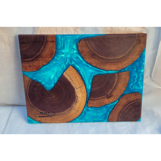 Live Edge Tree slices With Light Blue Epoxy